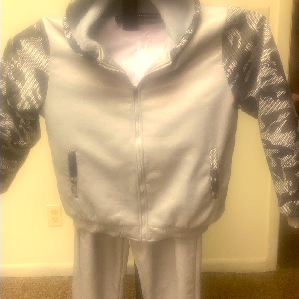 Gray track suit size Large jacket has camouflage long sleeves with fur lining